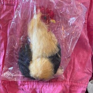 This is The Bearington Collection and the roosters name is Roy